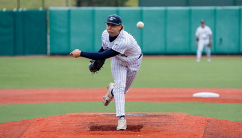 Graham Kasey pitching in GLVC baseball tournament