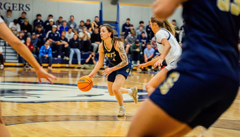 Kennedy Osterman playing basketball