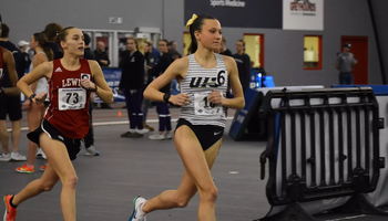 Maddie Miller racing indoor track