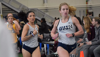 Jordan Serrano and Kaleigh Inniss racing indoor track