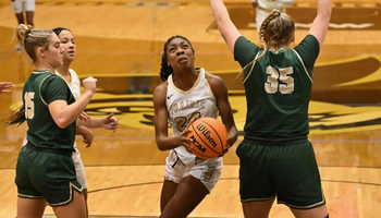 Niyah Udiowod  playing basketball