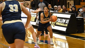 Kayla Rice playing basketball