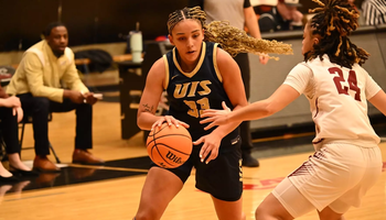 Allysia McDaniel playing basketball