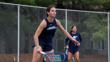 Ema Norma Bordean playing doubles tennis