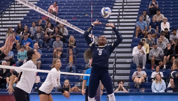 Erica Sledge playing volleyball as setter