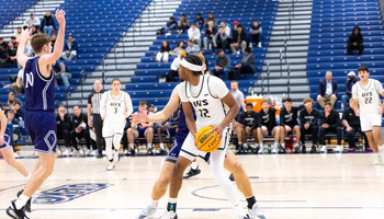 Marlon Williams playing basketball at UIS