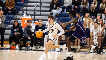 Isaiah Davis playing basketball 