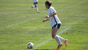 Abbie Gleason playing soccer