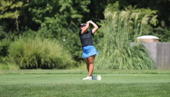 Gracie Russell golfing