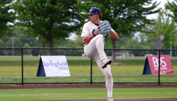 Jaden Mathon pitching for UIS in white uniform