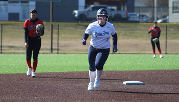 Emme Steward running the bases after hitting a home run