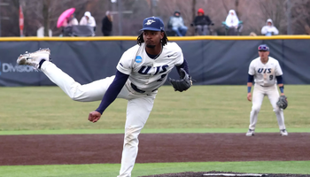 Kyle Tyler pitching in white UIS baseball uniform