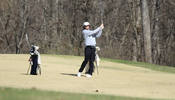 Jake Baldin golfing