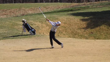 Julien Babineau using an iron