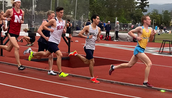 Isaac Cortes running outdoor track