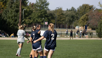 Kalli Drexler and Taytum Scarborough celebrating