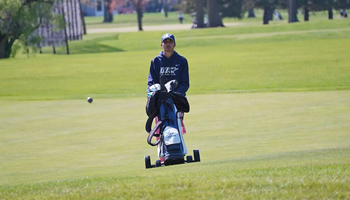 Ira Joshi walking on golf course