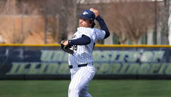 Isaac Graf pitching in white UIS baseball uniform