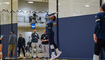 Erica Sledge playing volleyball