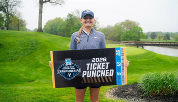 Elaine Grant with NCAA "Ticket Punched" sign