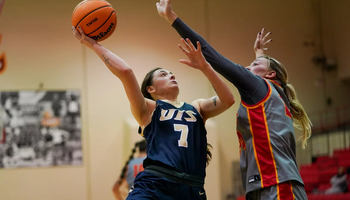 Kennedy Osterman playing basketball