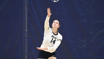 Kendall Johnson serving volleyball