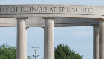 Students walking by UIS Colonnade