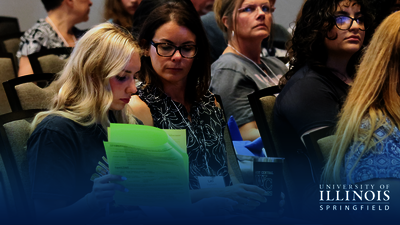 Mother and daughter looking over notes at Orientation.