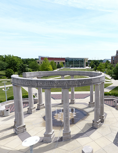 An aerial view of the UIS colonnade on the University of Illinois Springfield campus on a dunny day during the summer season.
