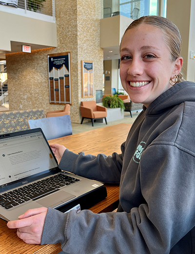 Jordan Serrahn, a MBA student, uses free Kaplan test prep software to study for the LSAT.