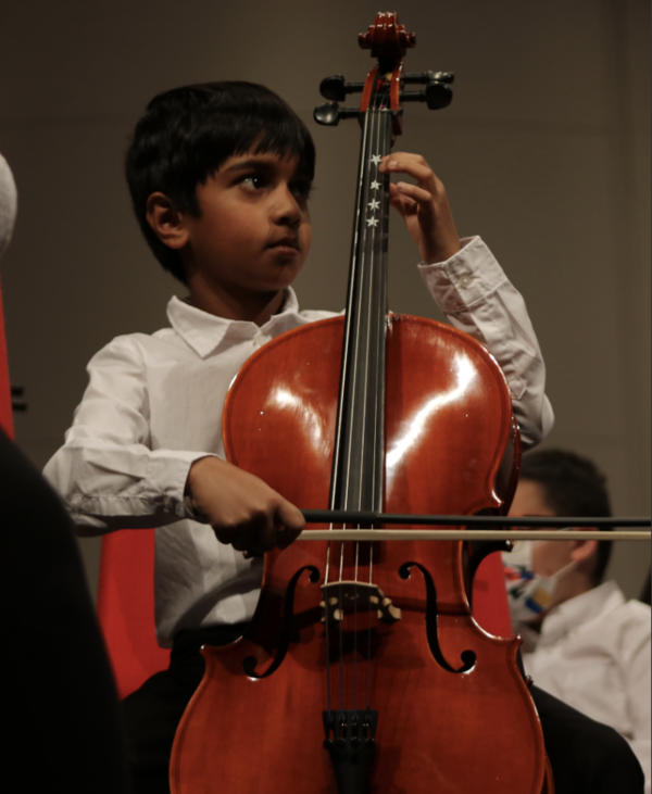 Kid playing cello