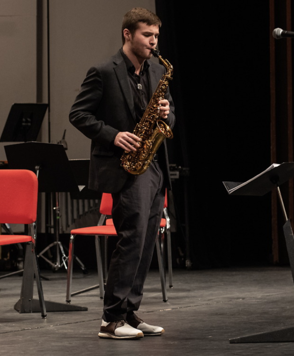 Student playing saxophone