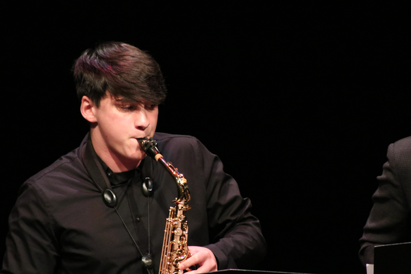 Jazz performer playing the saxophone