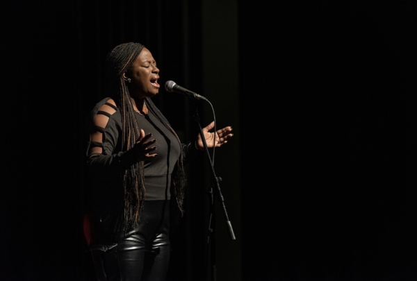 Woman singing with a microphone