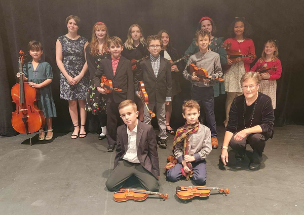 UIS String academy taking a group picture