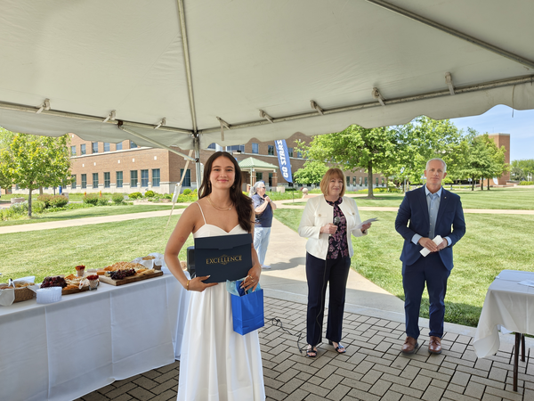 Grace Lehmann receiving award