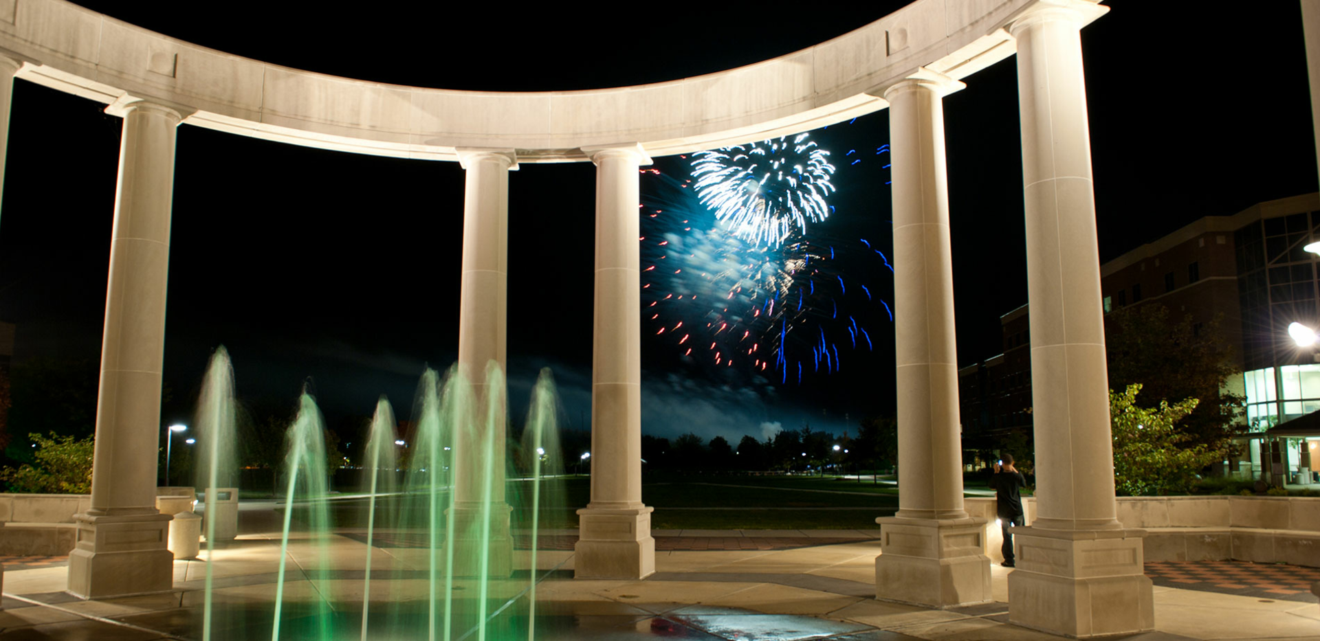 colonnade with fireworks