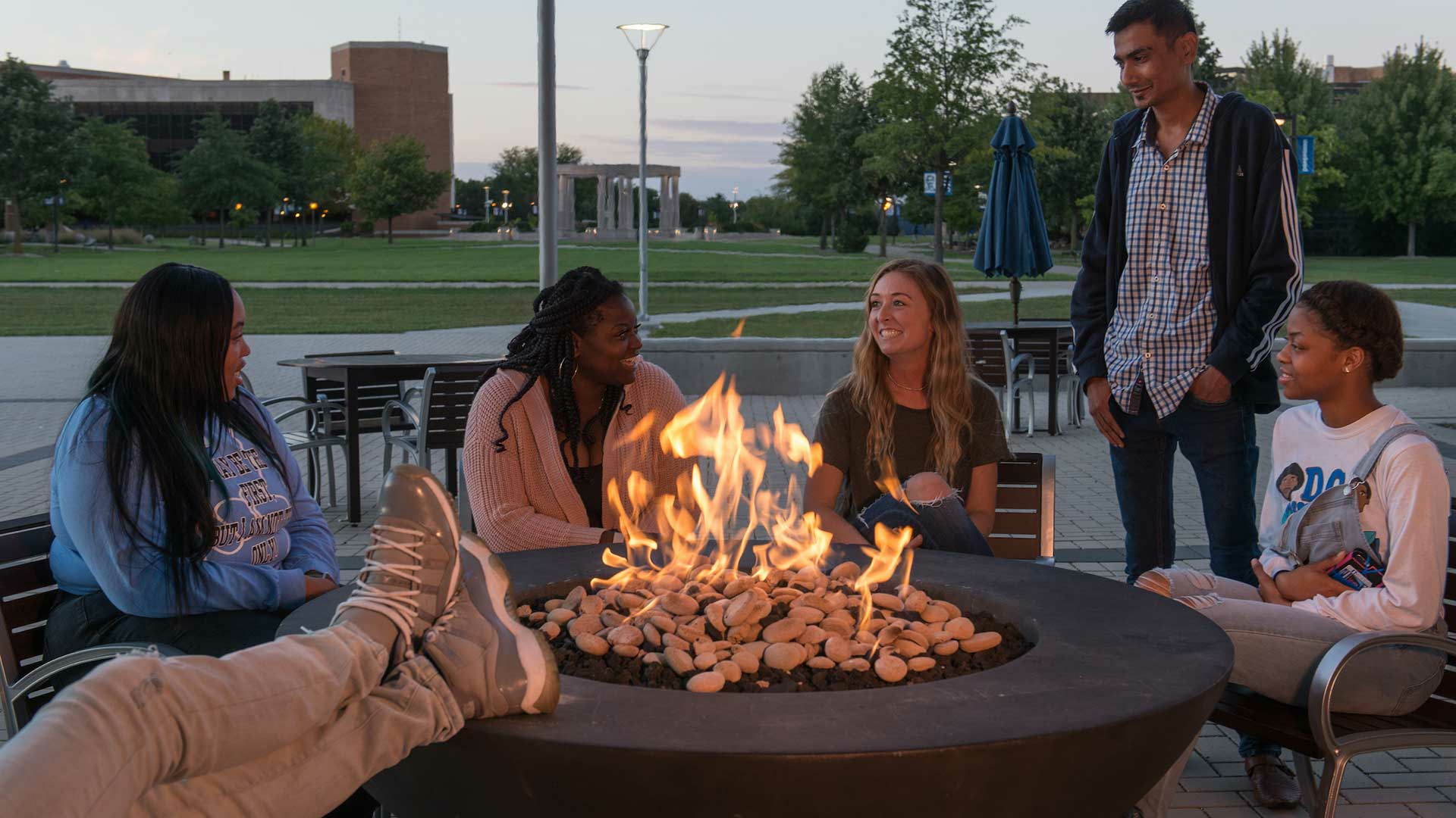 students relaxing outside union