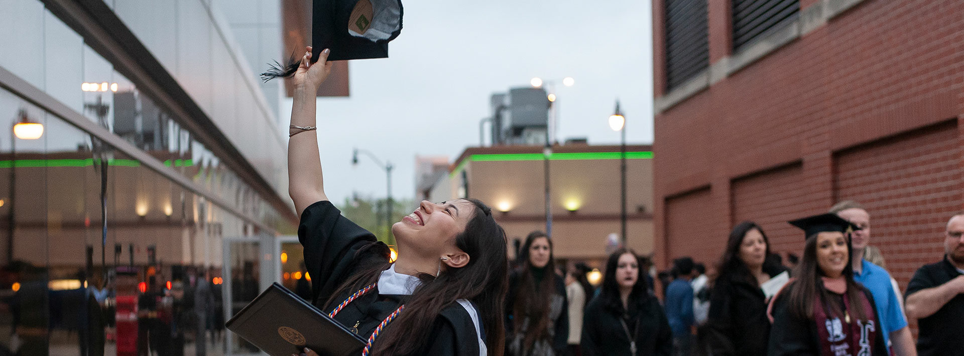 Graduate celebrating her new degree