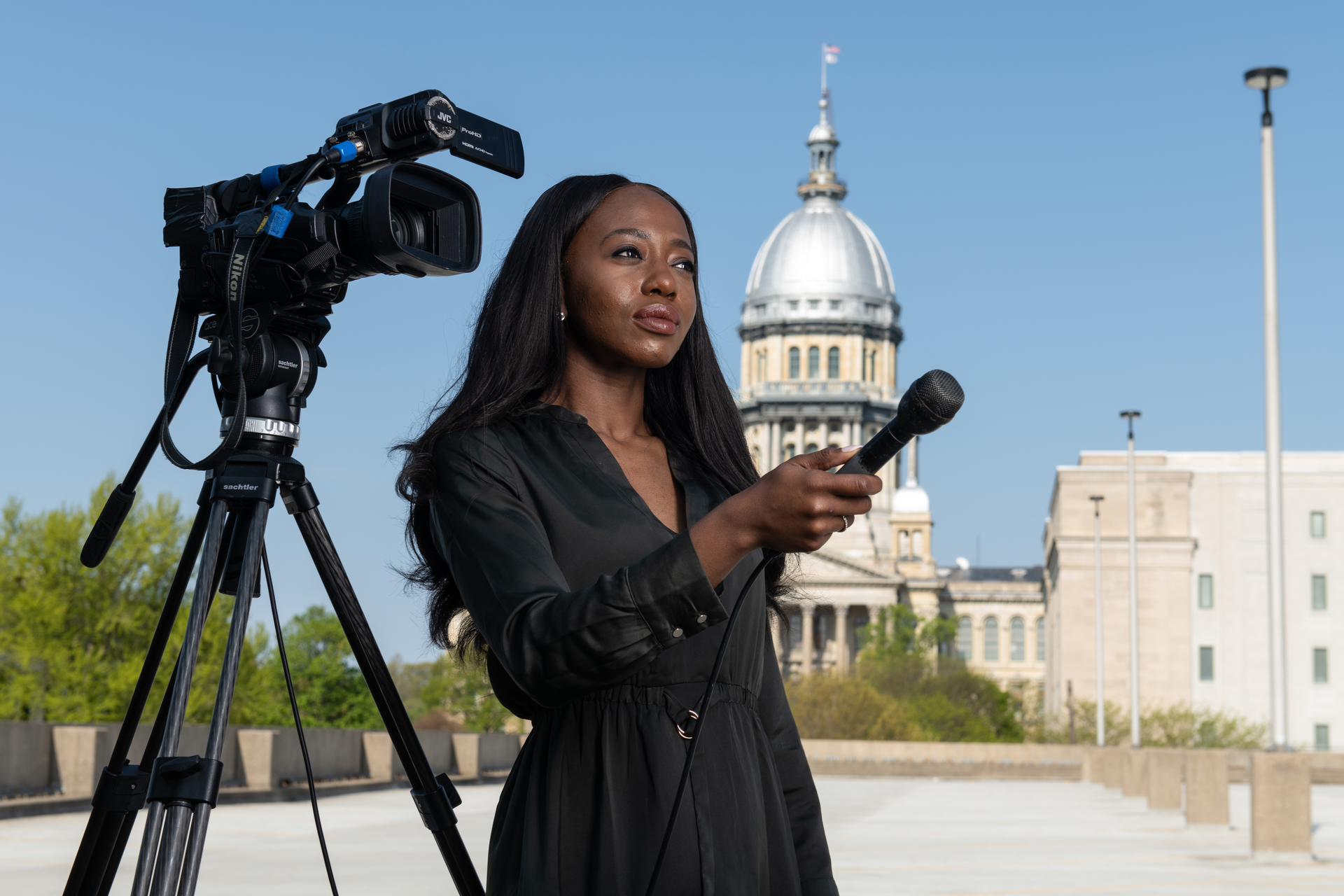 Student reporter outside of Illinois Capitol