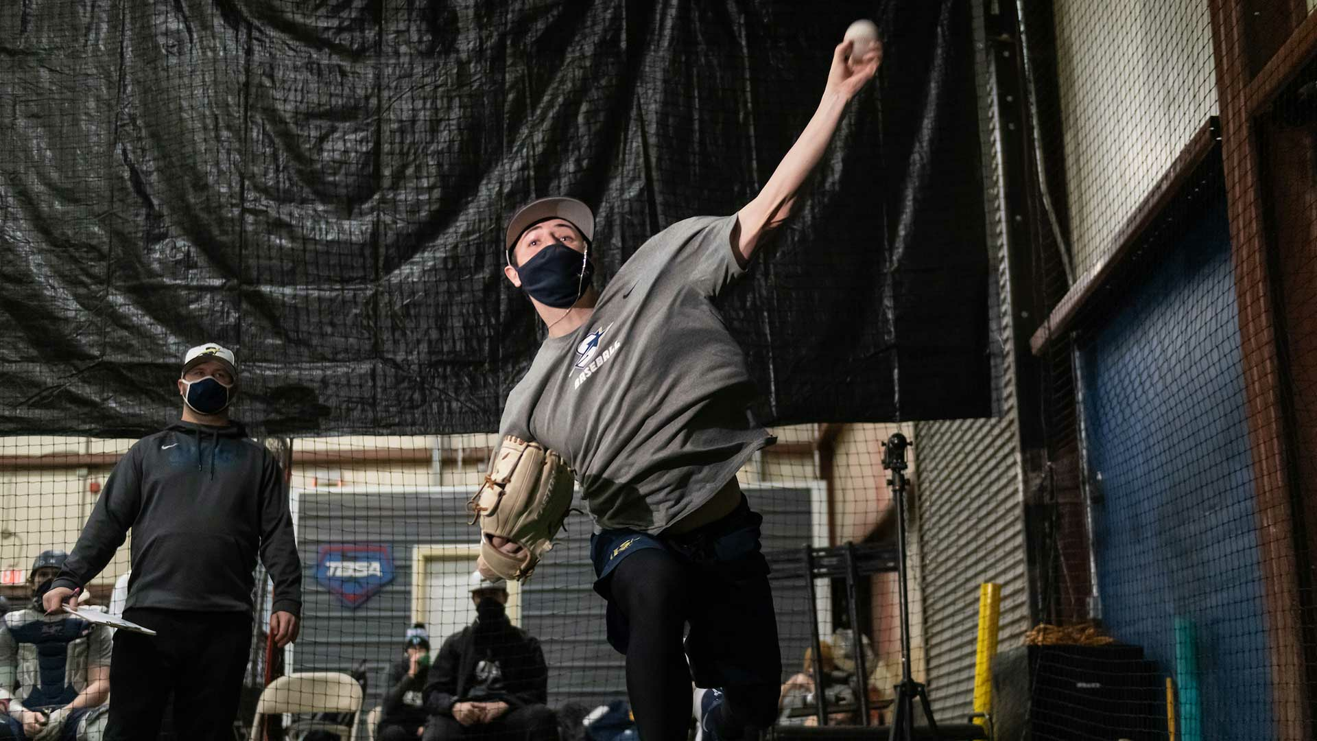student practicing throwing