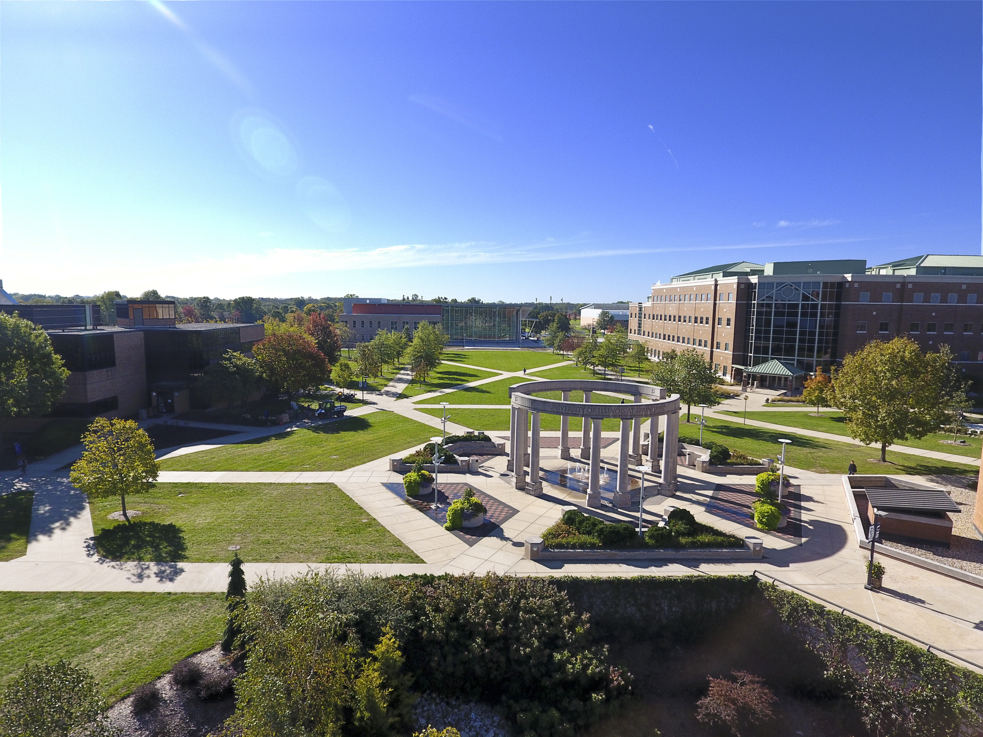Drone photo of UIS campus with the colonnade, student union and UHB in view.