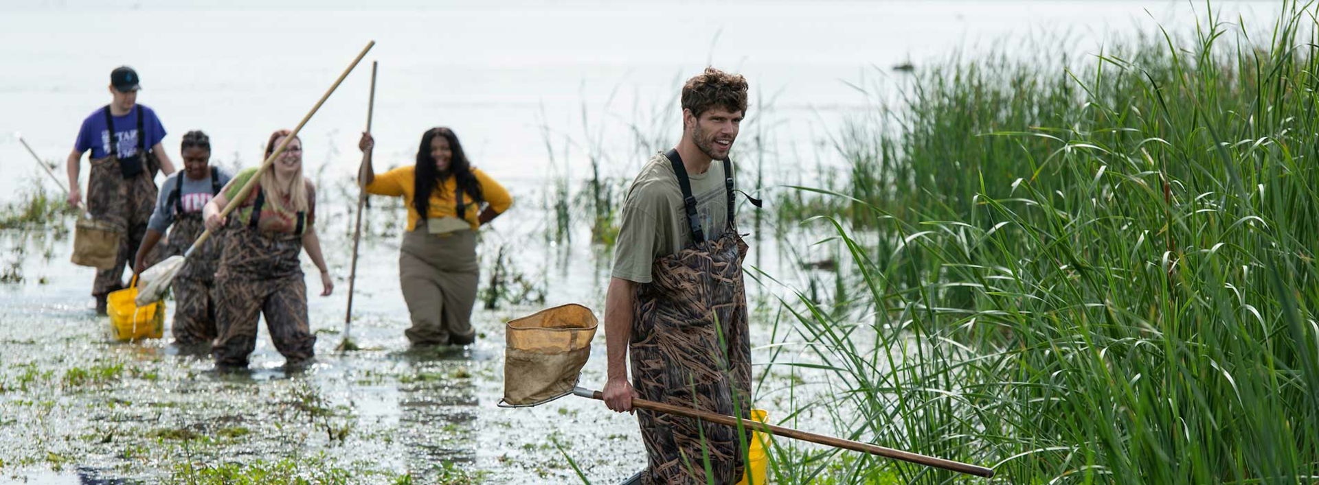 students in the lake