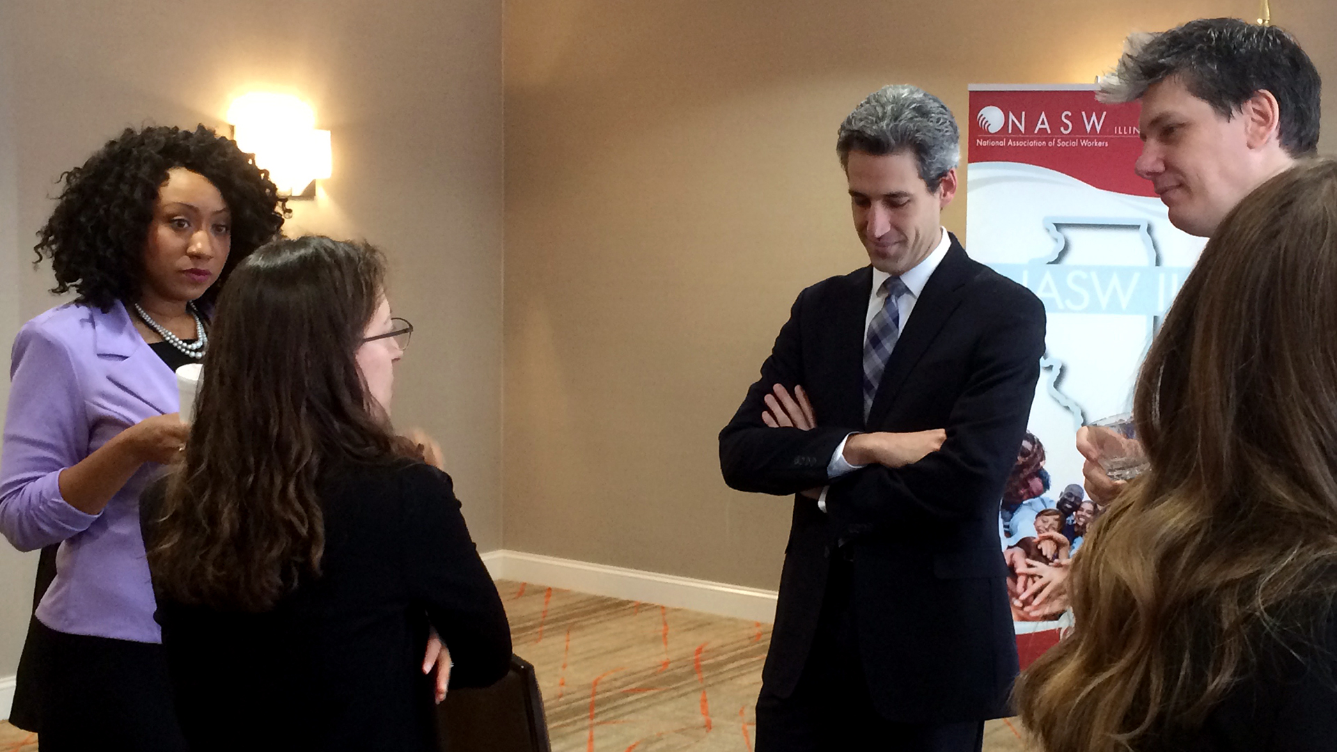 Students and politicians at NASW meeting