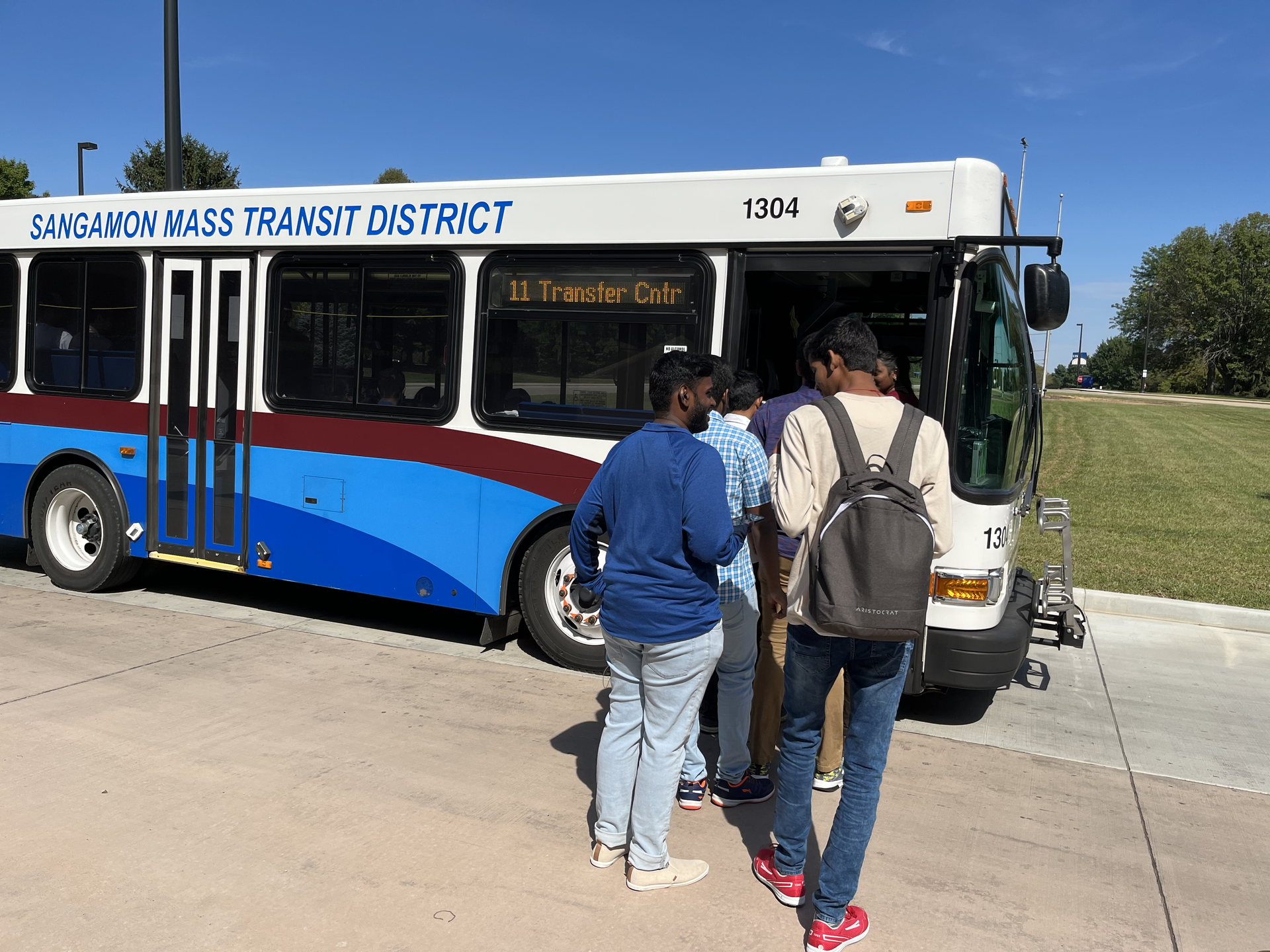 students entering bus 