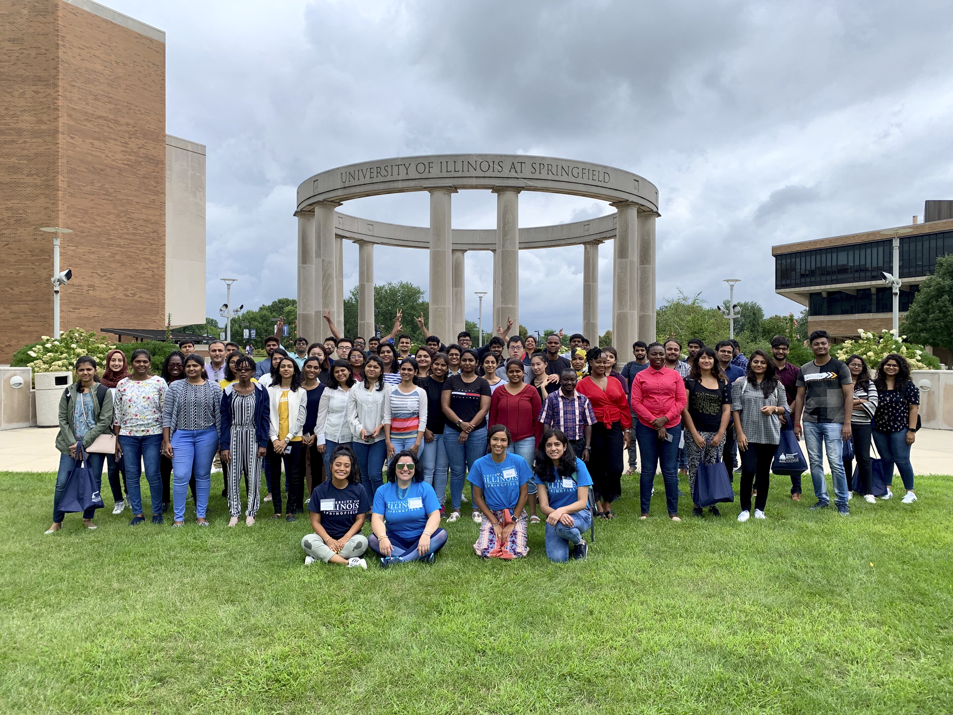 new international students in front of colonnade 