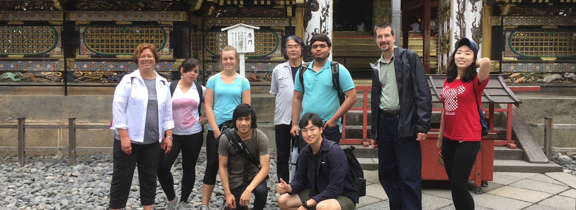 students and teachers posing for group photo in Ashikaga