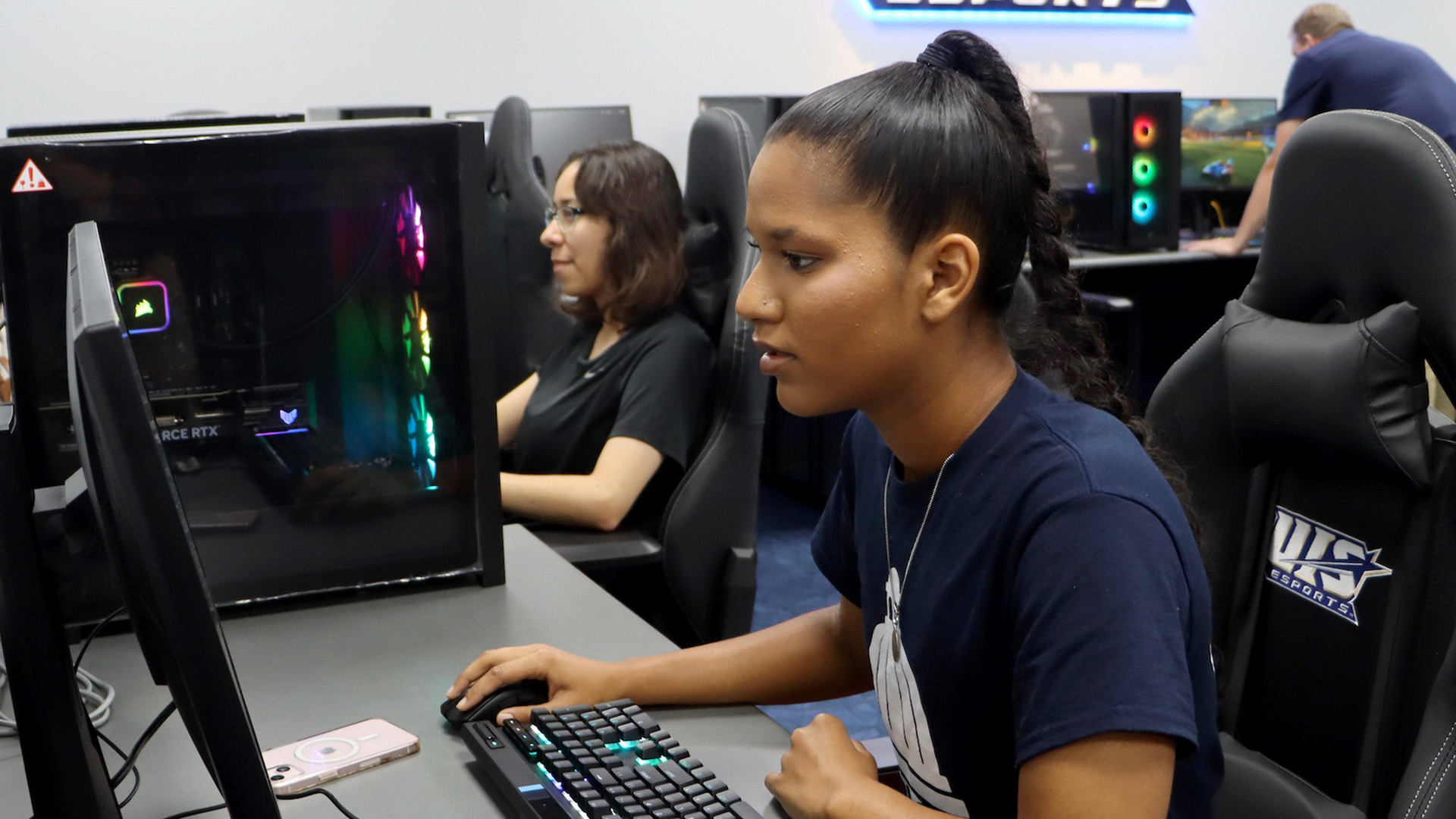 student at UIS Esports gaming station