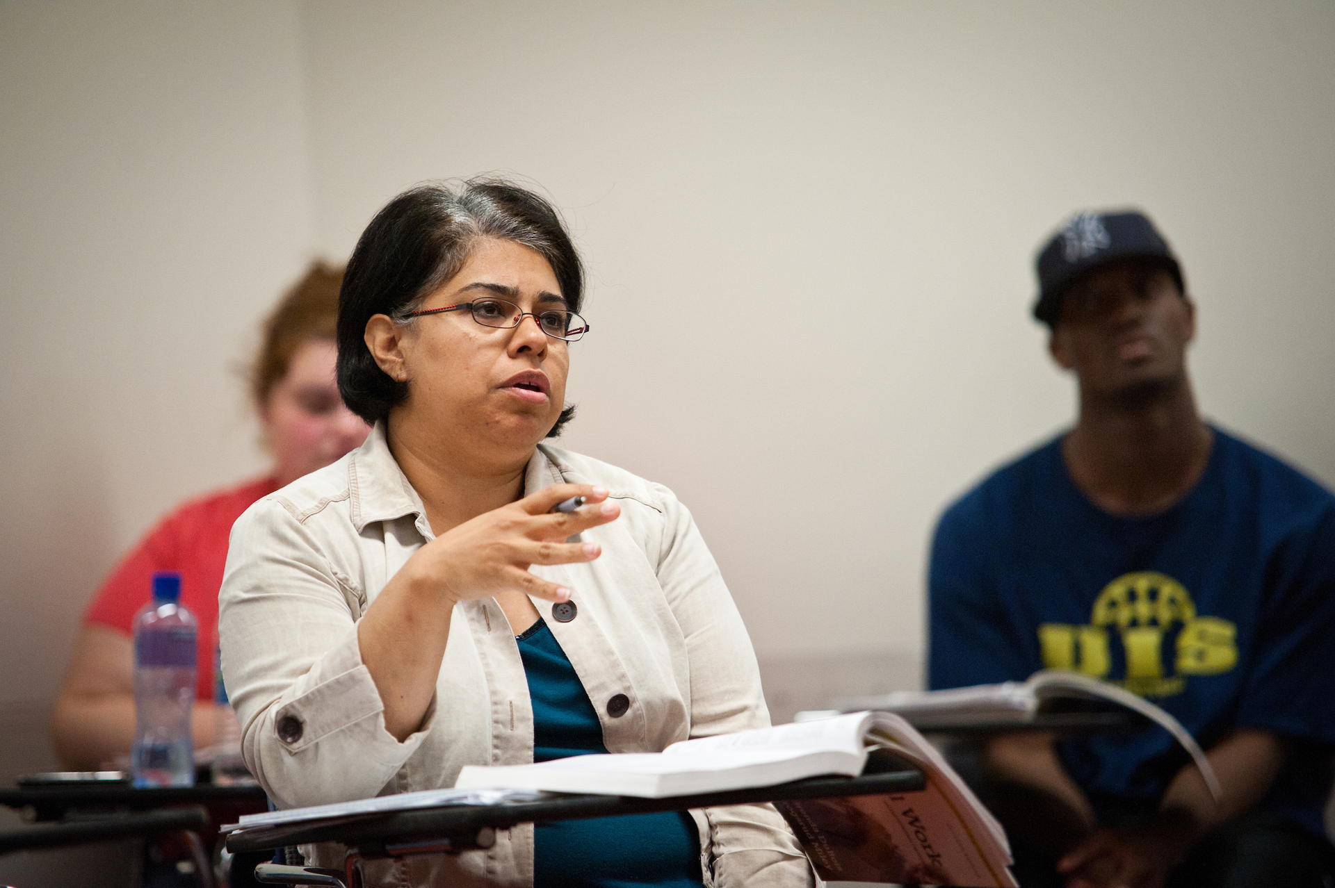 UIS student engaging with professor and classmates