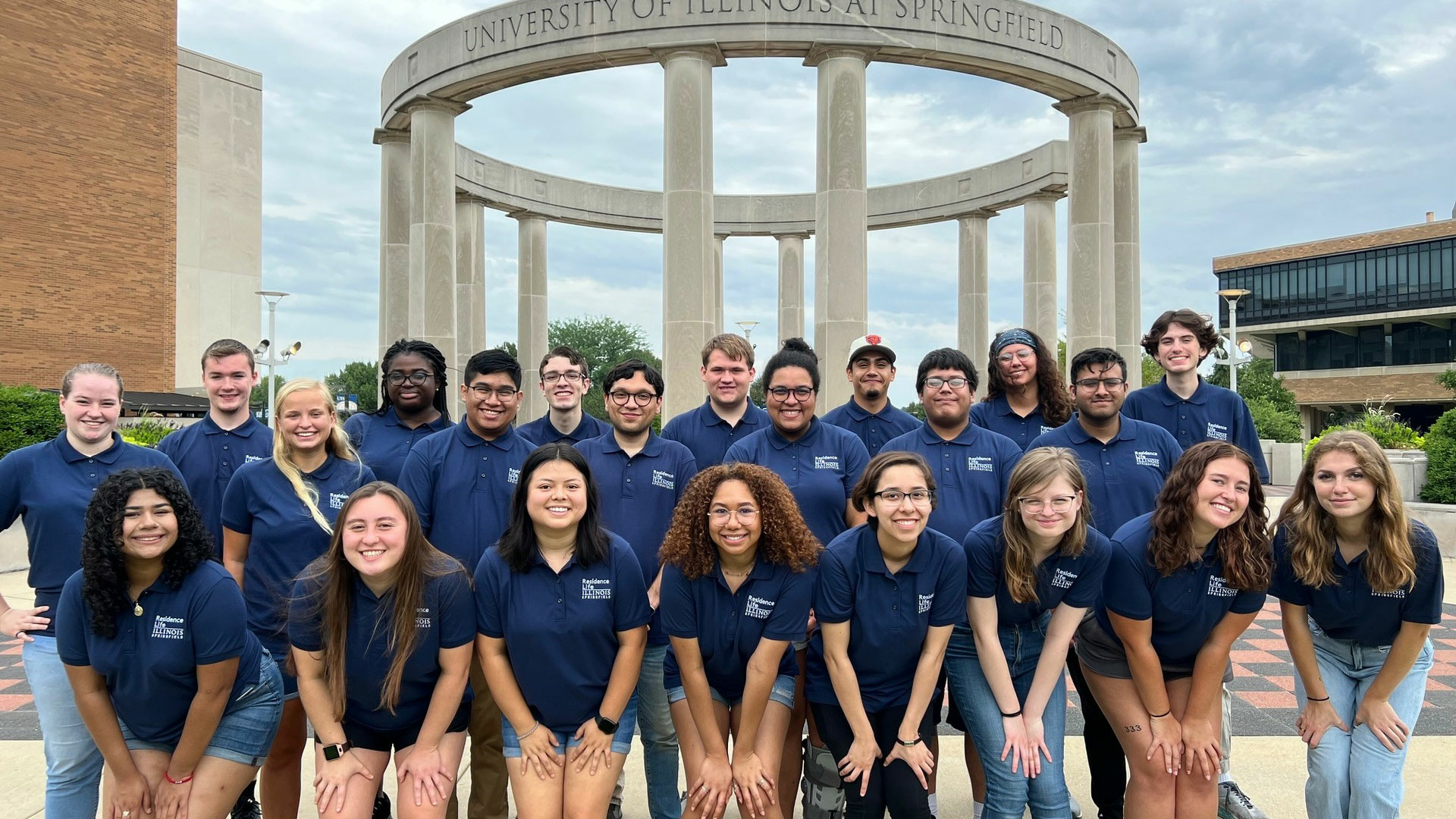 the RAs of UIS posing in front of the colonnade